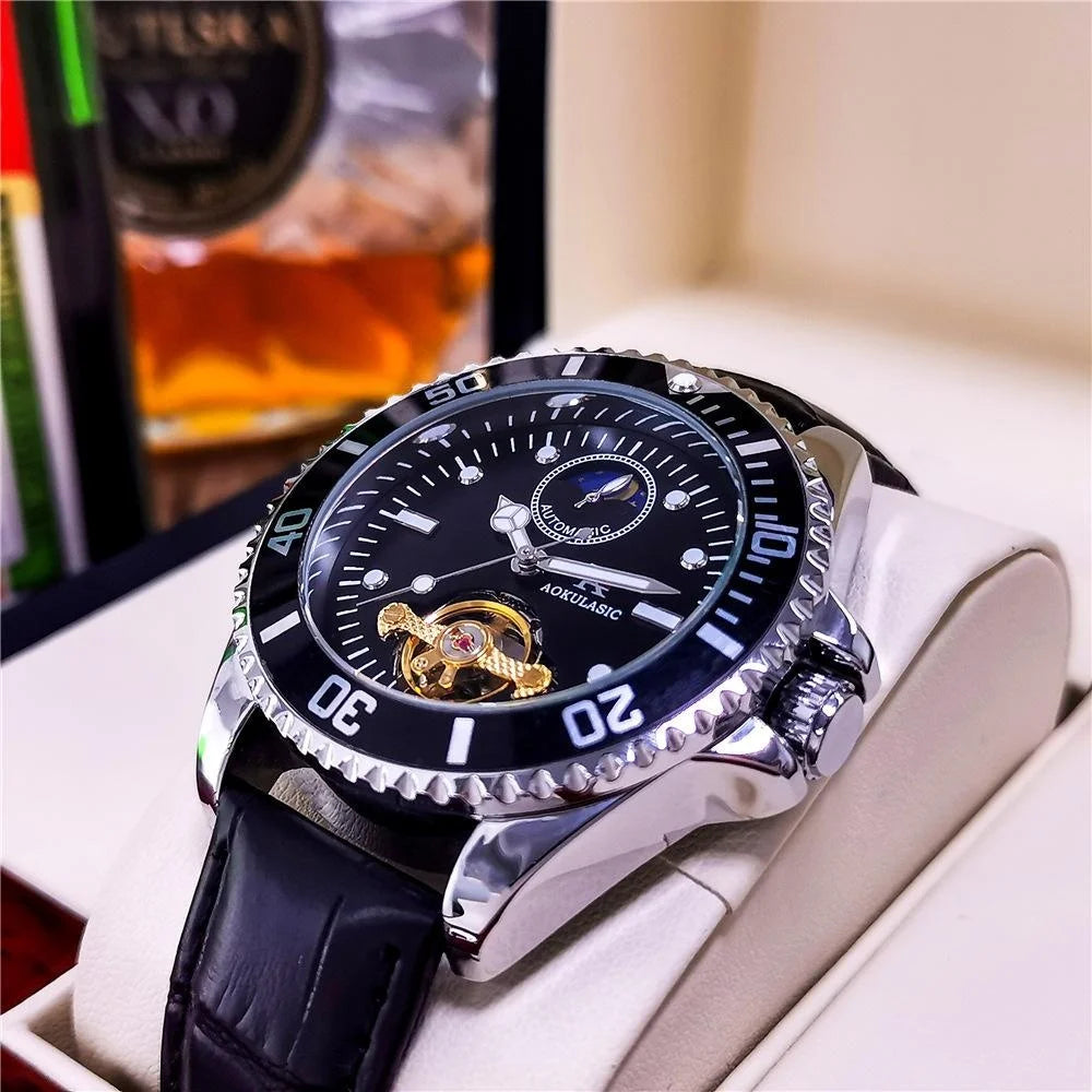 Men's mechanical skeleton watch with dark dial and gold gears, black leather strap