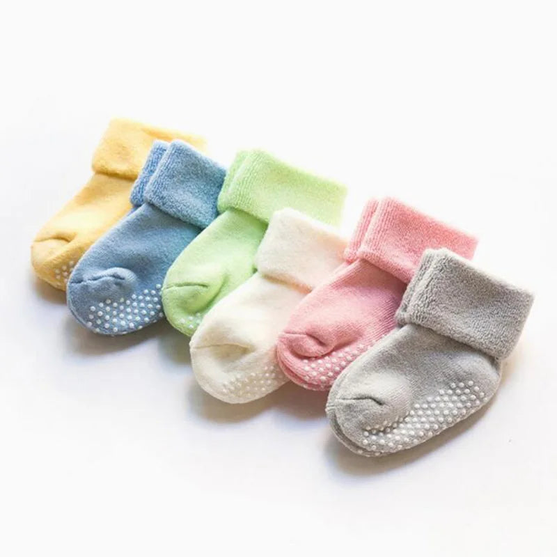 2-pack baby socks in mixed colors: blue, green, pink, white, gray, and yellow