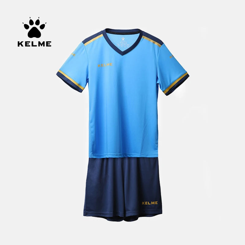 Kids light-blue soccer jersey and navy shorts kit, KELME branding