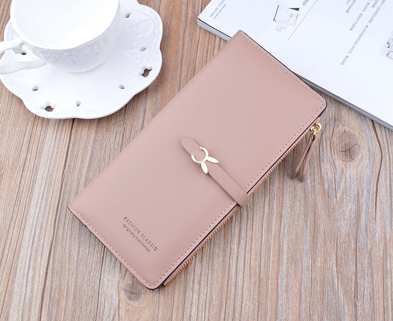 Long wallet purse, blush pink with flap and bow clasp, gold zipper hardware
