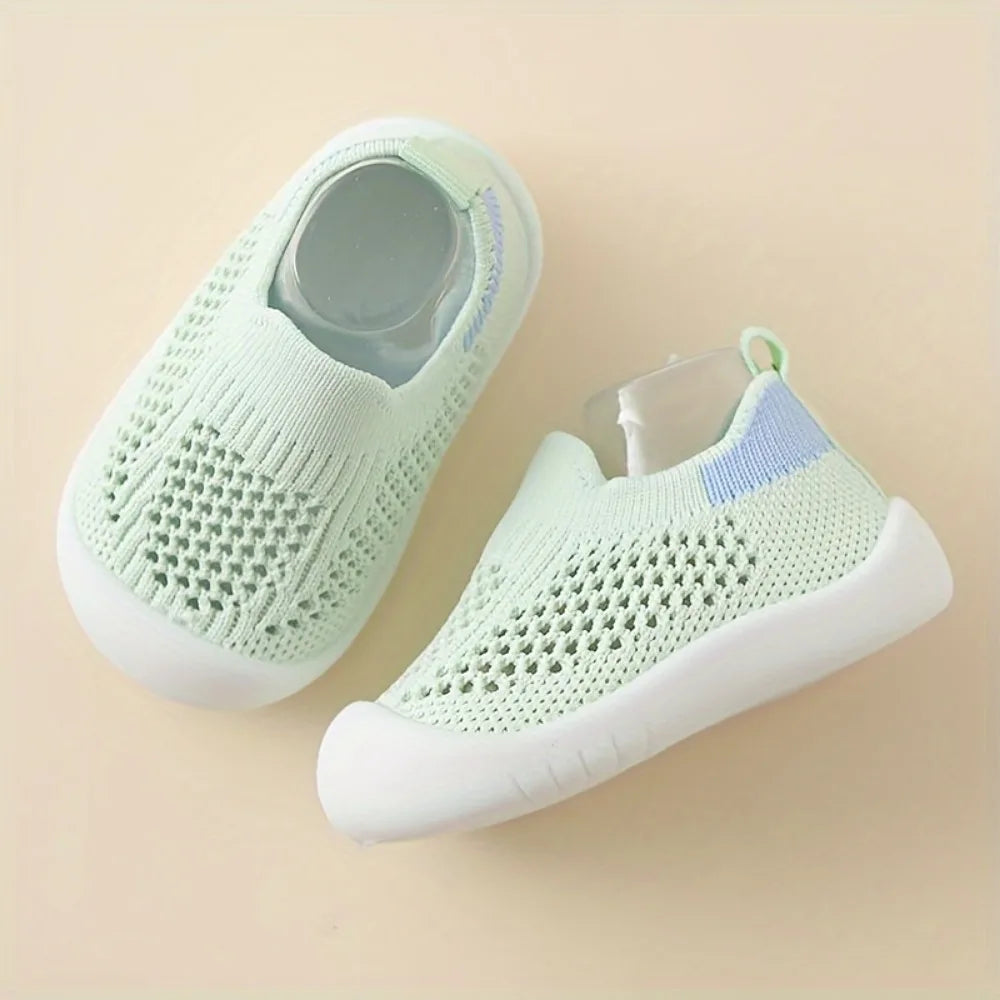 Mint green toddler mesh slip-on sandals with breathable knit upper and white sole