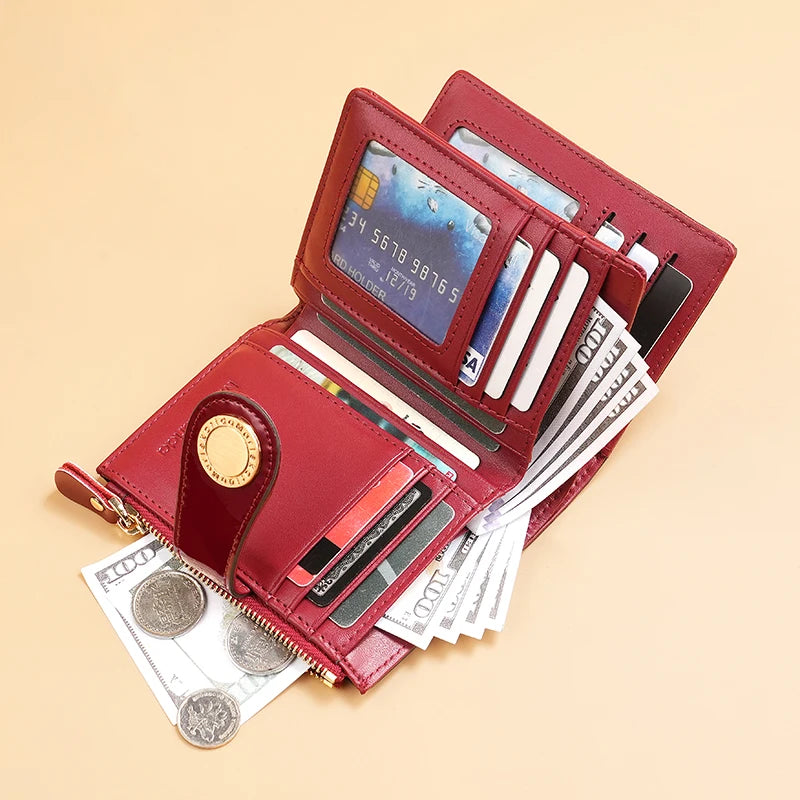 Red short wallet open with card slots, gold-tone zipper, and money and coins