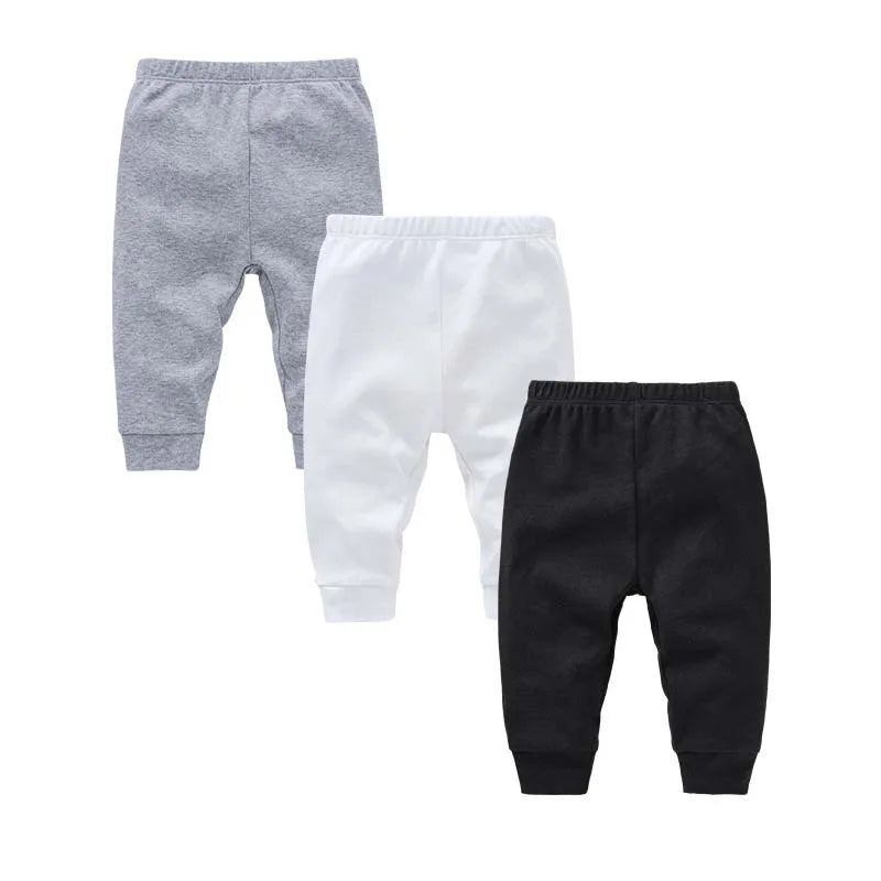 Solid-color baby jogger pants set, gray, white, and black cuffed leggings