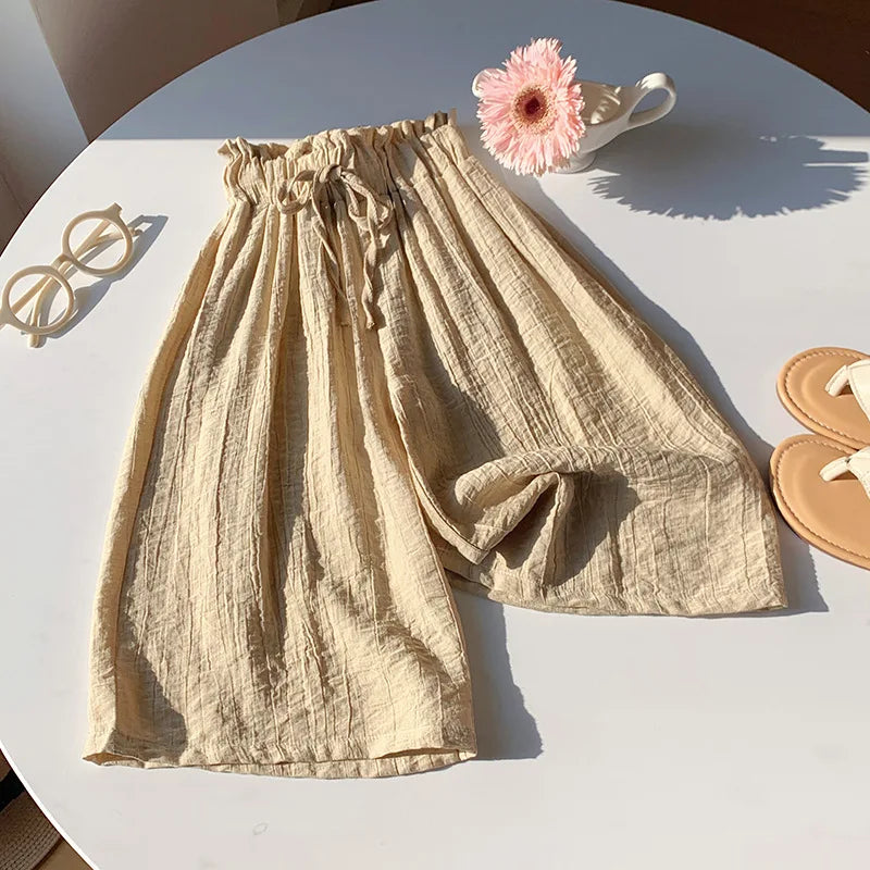 Beige toddler summer pants with elastic waist and gathered drawstring