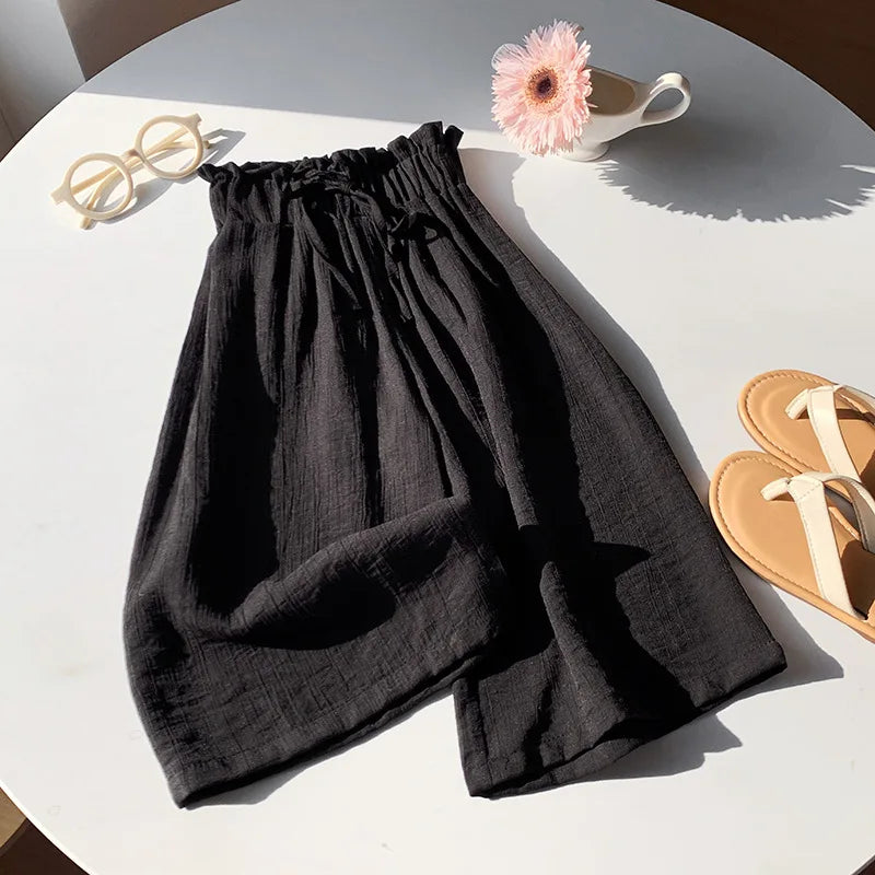 Black toddler summer pants with elastic waist and gathered drawstring