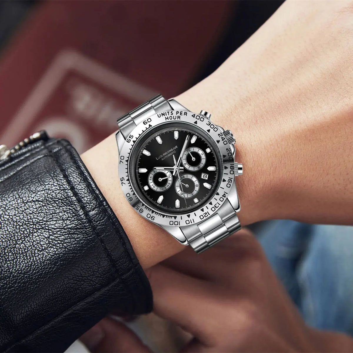 Men's mechanical business watch with silver bracelet and black multifunction dial
