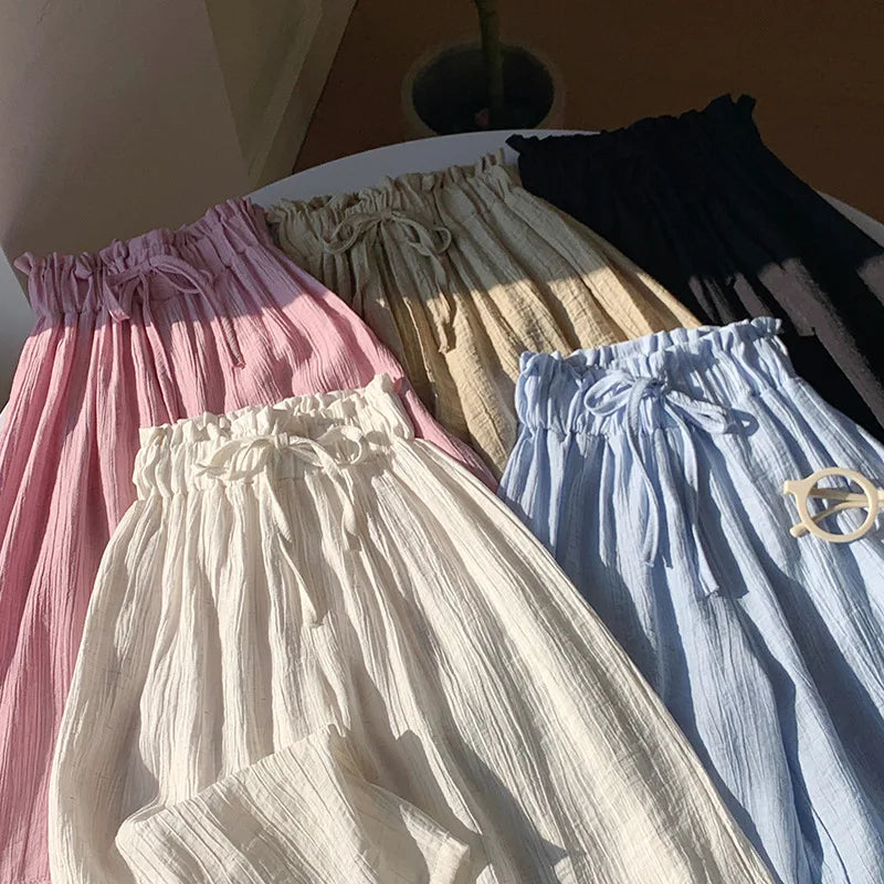 Assorted toddler summer pants: pink, beige, light blue, and black with elastic waist