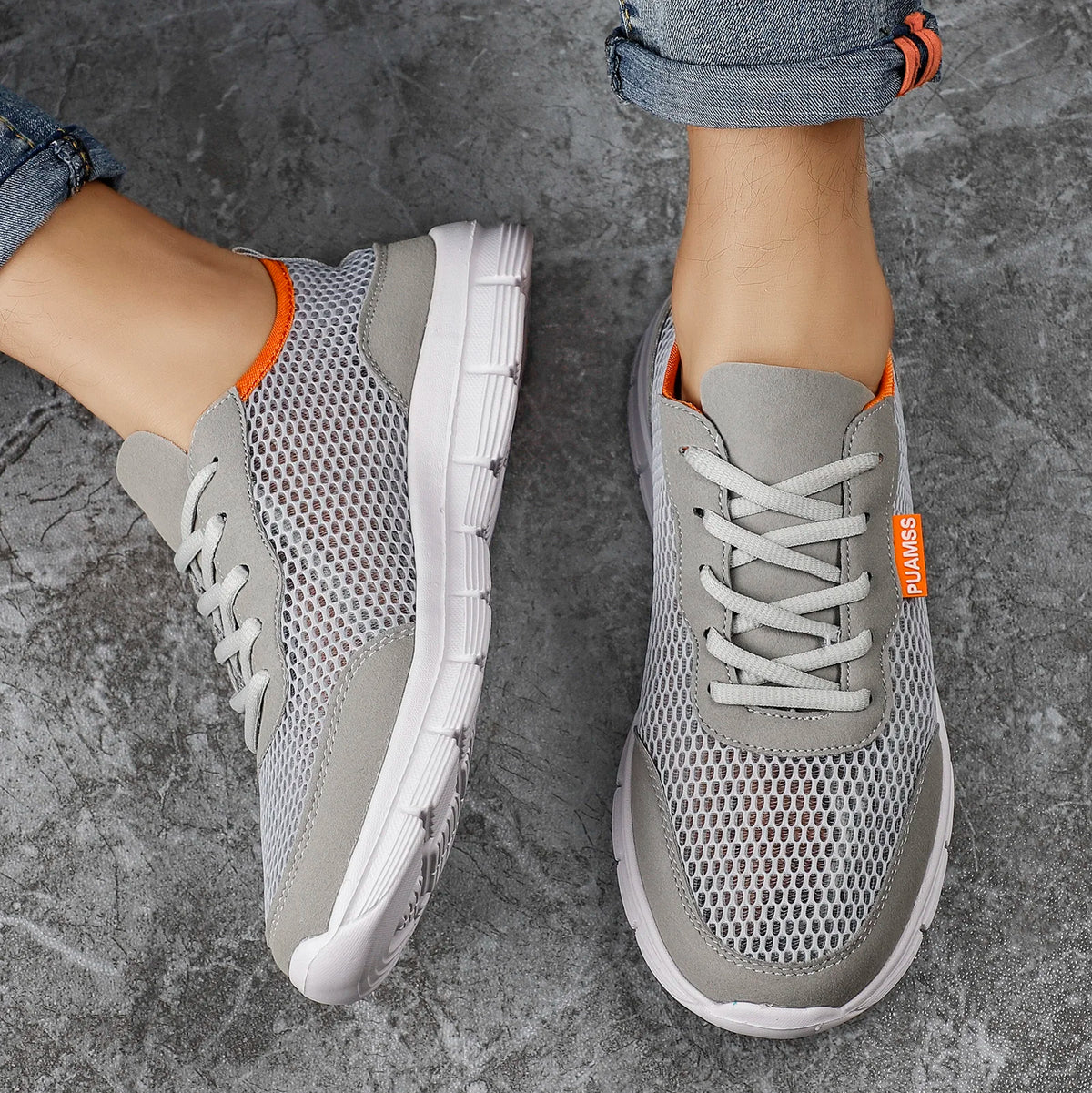 Gray mesh lace-up sneakers with padded collar and white rubber sole
