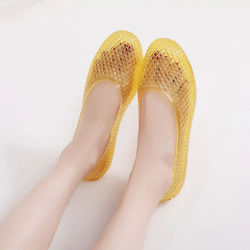 Yellow jelly shoes slip-on flats with textured grid upper and rounded toe