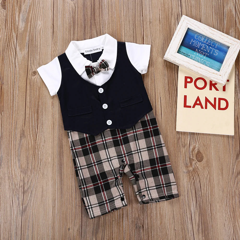 Infant boy suit romper with navy vest, white collar, bow tie, plaid short pants
