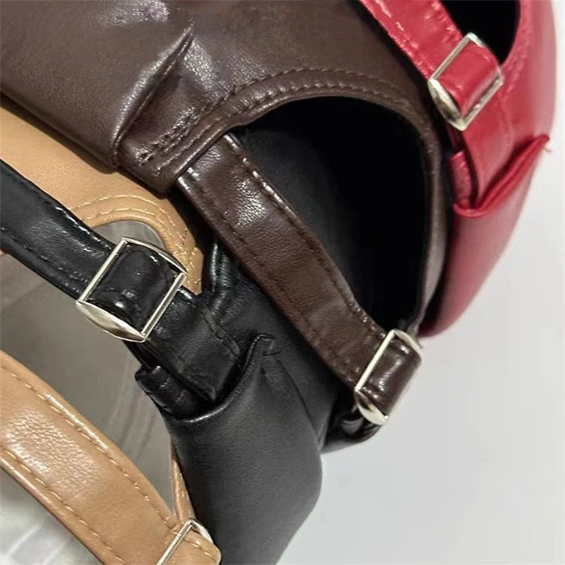 PU leather docker cap strap and buckle detail on brown, black, and red caps