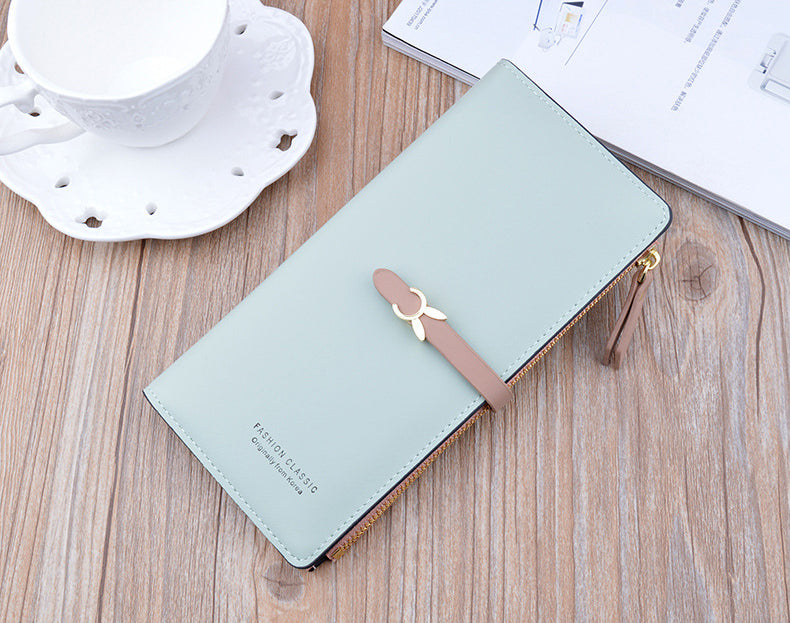 Long wallet purse, light mint with flap and bow clasp, gold zipper hardware