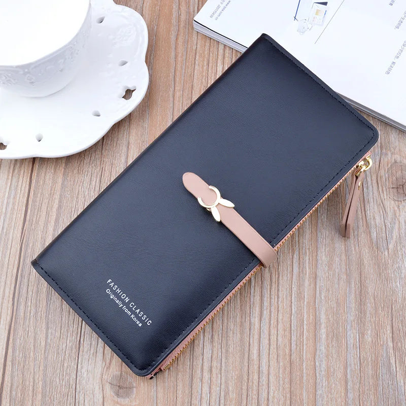 Long wallet purse, black with bow clasp strap, gold zipper and matching flap