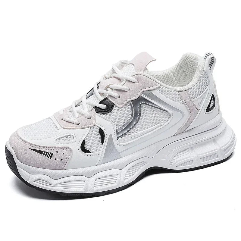 White chunky platform sneakers, close-up lace-up upper with mesh panels