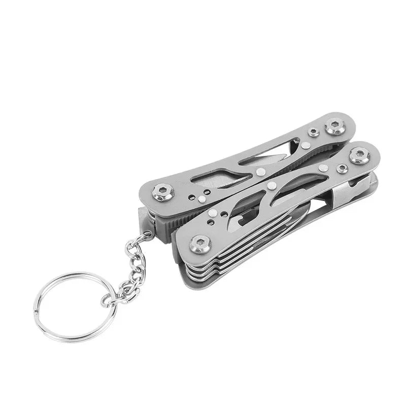 Silver multi-tool folding pocket knife with pliers, folded with keyring