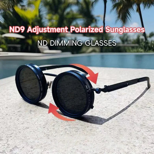 Round sunglasses with black rims, dark lenses, adjustable temple arms
