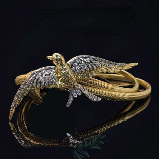 Gold bird waist chain belt with elastic coiled bands and winged metal charm