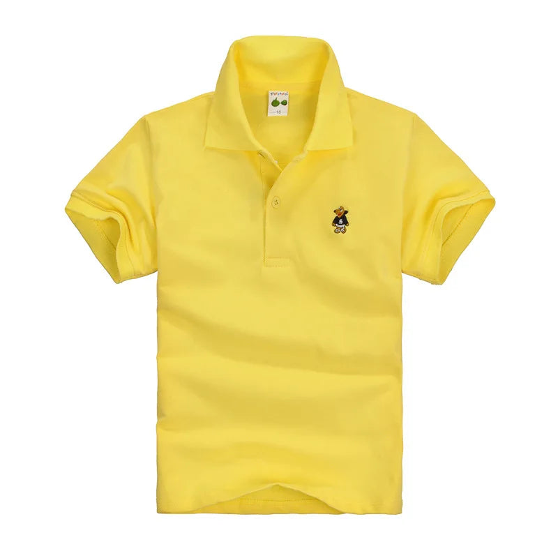 Boys yellow short-sleeve polo shirt with small cartoon chest logo