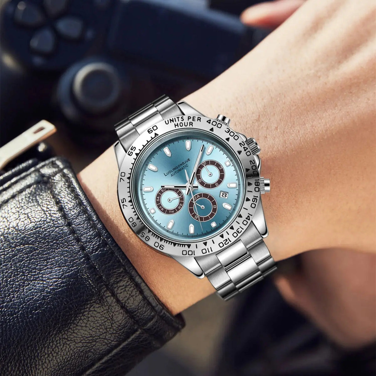 Men's mechanical business watch with silver bracelet and light blue multifunction dial