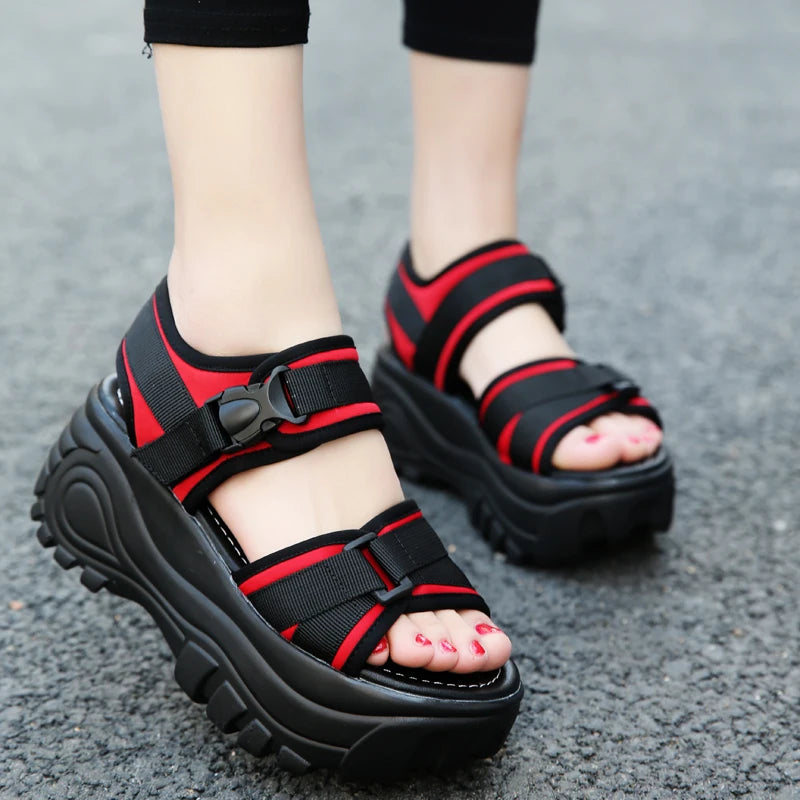 Red and black platform strappy sandals with adjustable buckles and open toe