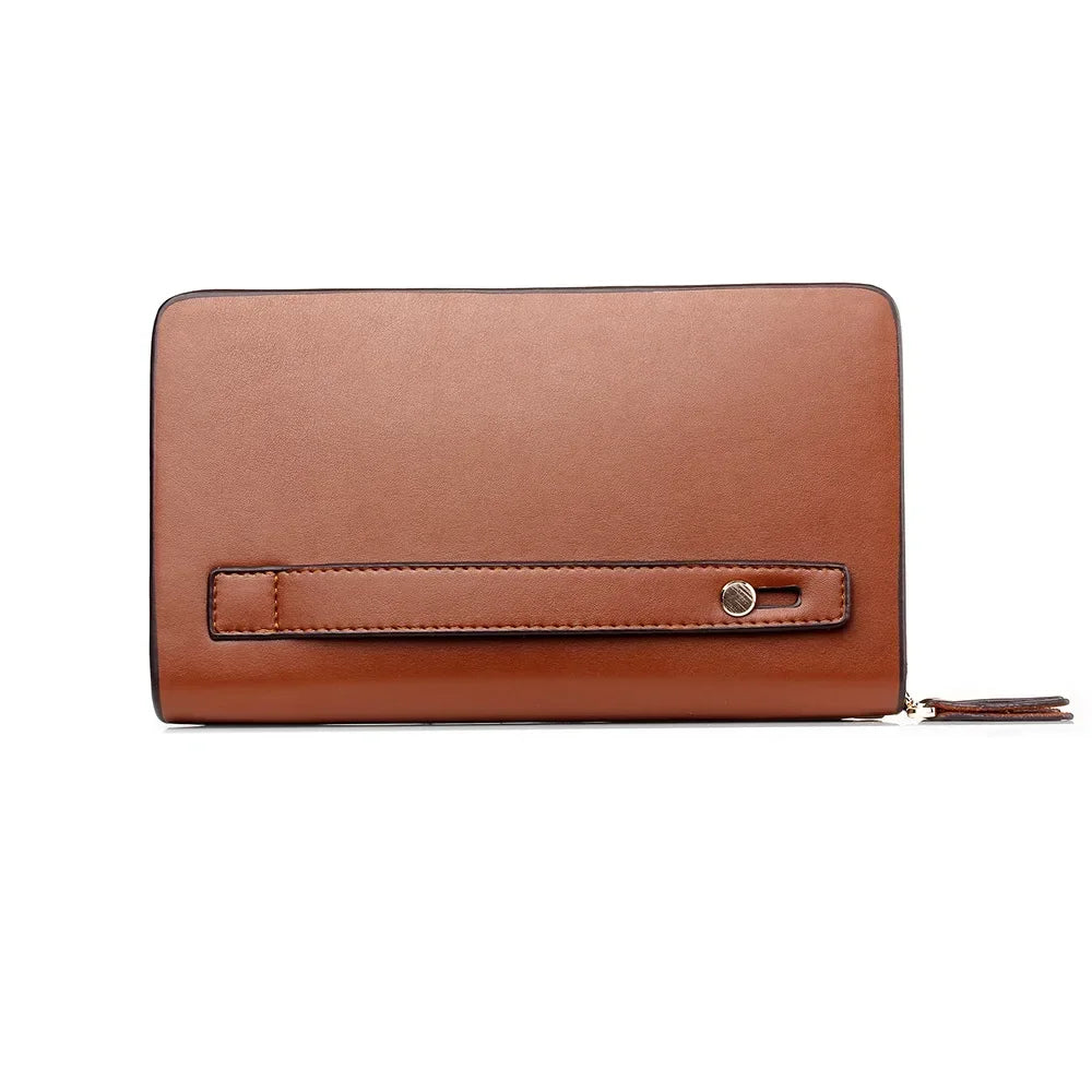 Brown wallet clutch with front strap tab detail and side zipper pull