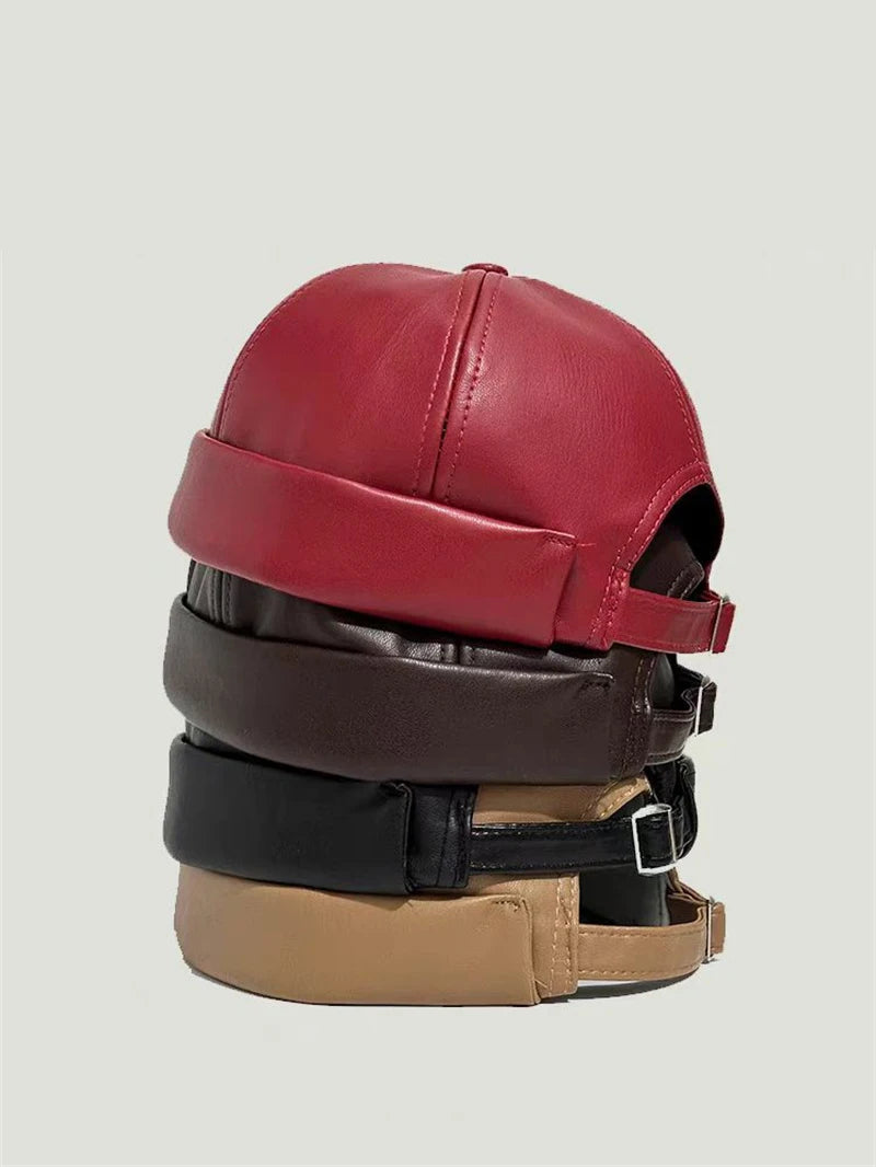 Unisex PU leather docker cap in red with adjustable strap and buckle