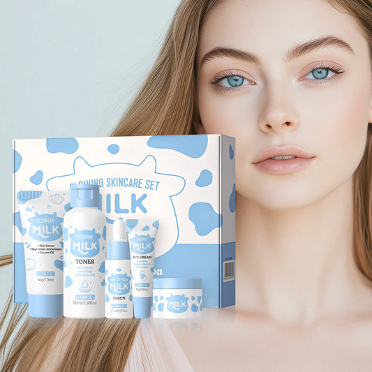 Milk-inspired glowing skincare set with toner, serum, and cream bottles and box