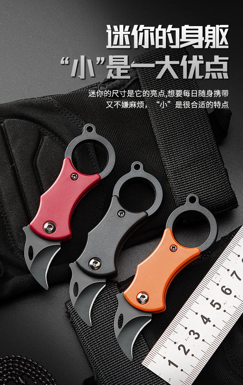 Folding pocket knives with keychain rings, red, black, and orange handles