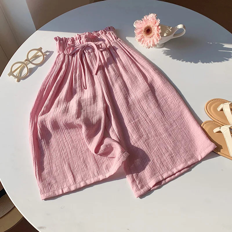 Pink toddler summer pants with elastic waist and gathered drawstring