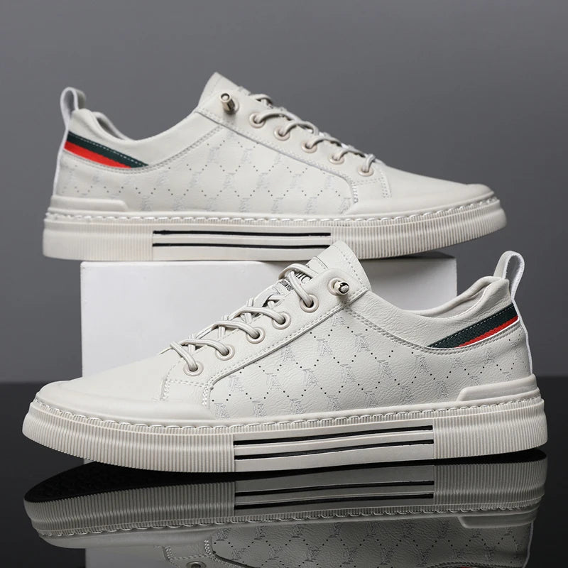 White low-top lace-up sneakers with textured upper, metal eyelets and side stripe detail