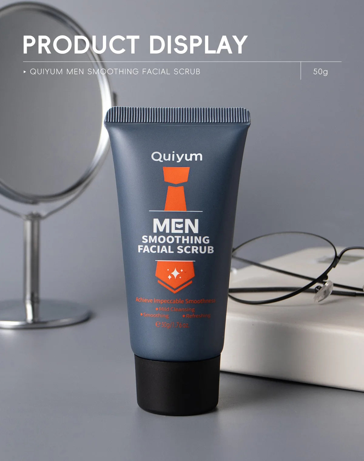 Men's smoothing facial scrub tube standing with a cap and glasses nearby