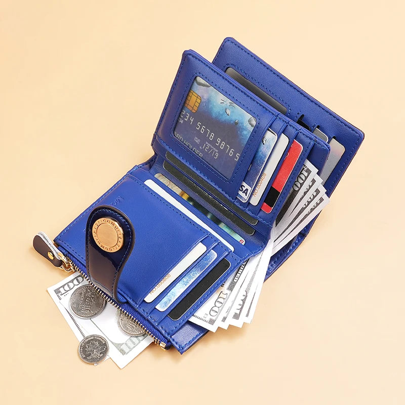 Blue short wallet open with card slots, gold-tone zipper, and stacked bills