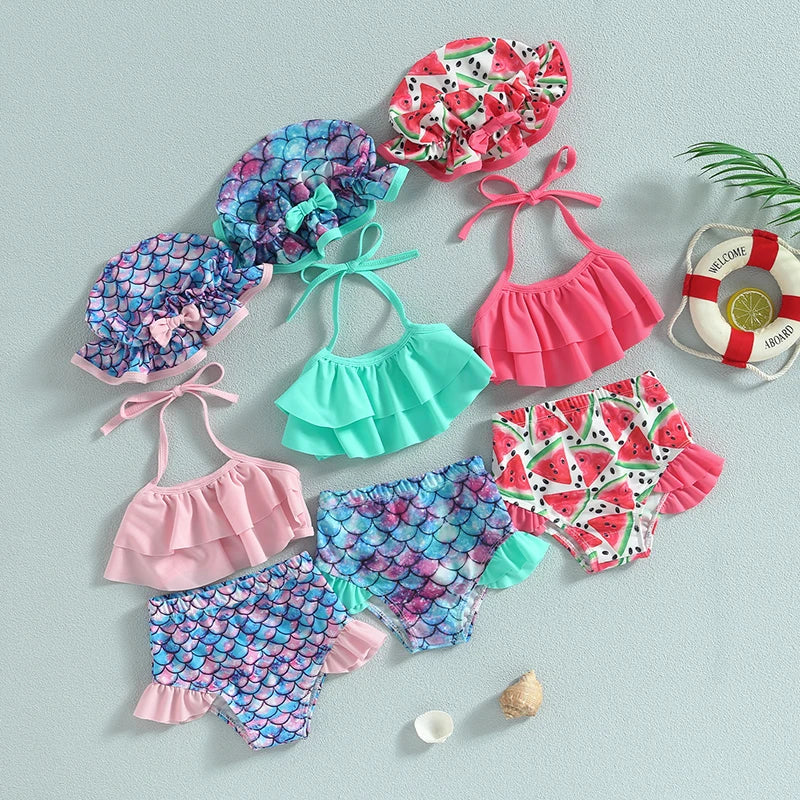 Toddler ruffle bikini set with watermelon print bottoms, pink top, and matching hat