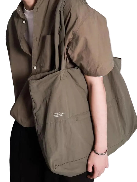 Green splashproof nylon office tote with top handles and front pocket