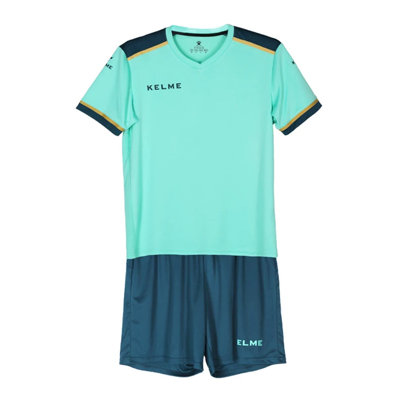 Kids mint soccer jersey and teal shorts kit, KELME branding