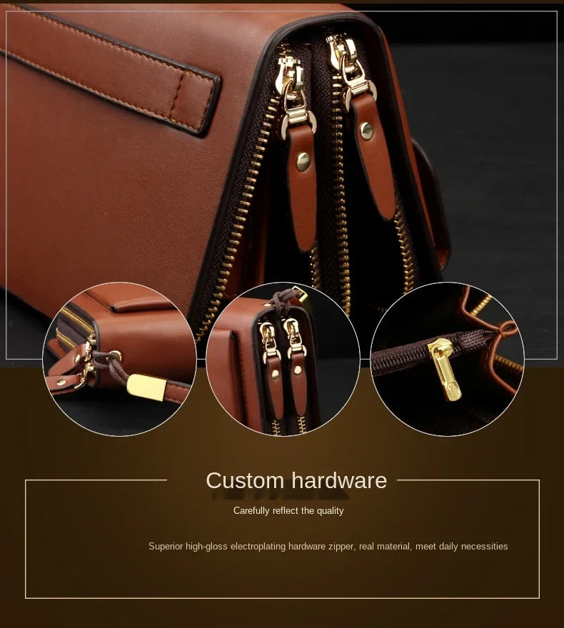 Brown leather men's wallet with double zippers and gold hardware, close-up detail