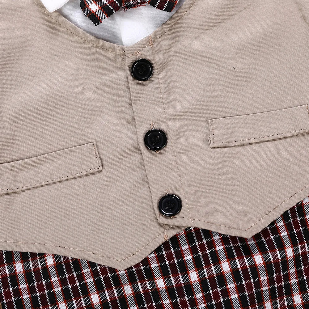 Close-up of khaki vest buttons and pockets on infant suit romper with plaid shorts