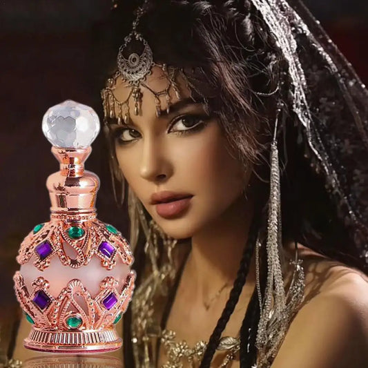 Ornate rose-gold perfume bottle with faceted jewel cap, 12 ml