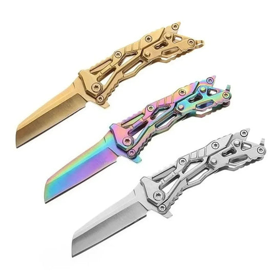 Compact folding pocket knife with gold, rainbow, and silver handles; keychain style.