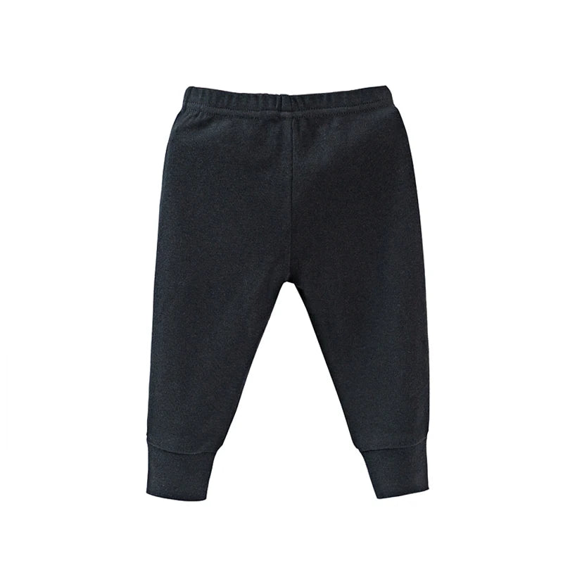 Black baby cotton jogger pants with elastic waistband and ankle cuffs