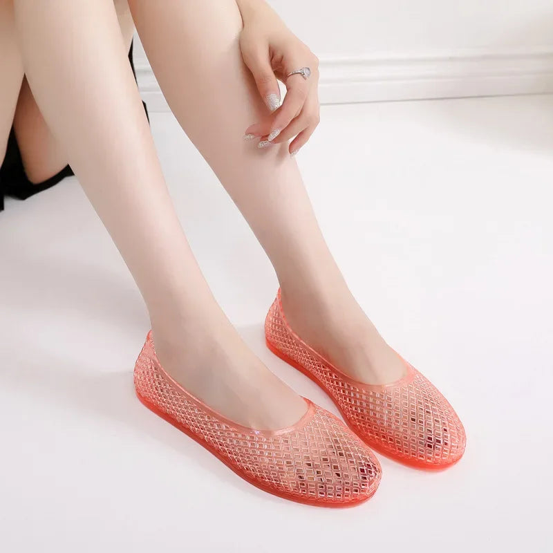 Coral red jelly shoes slip-on flats with textured grid upper and rounded toe