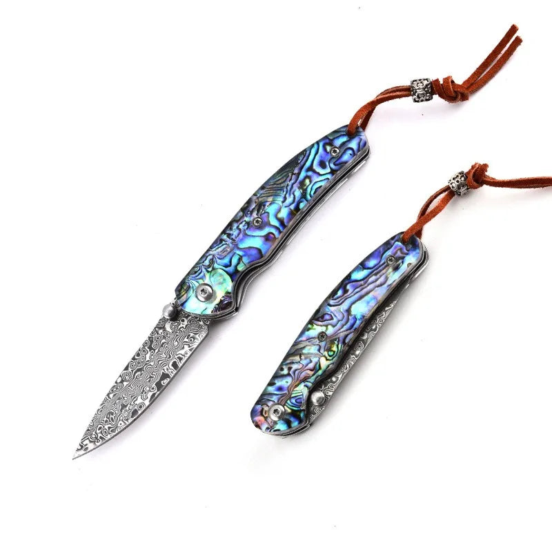 Set of 2 Damascus steel folding knives with iridescent blue handles and leather cords
