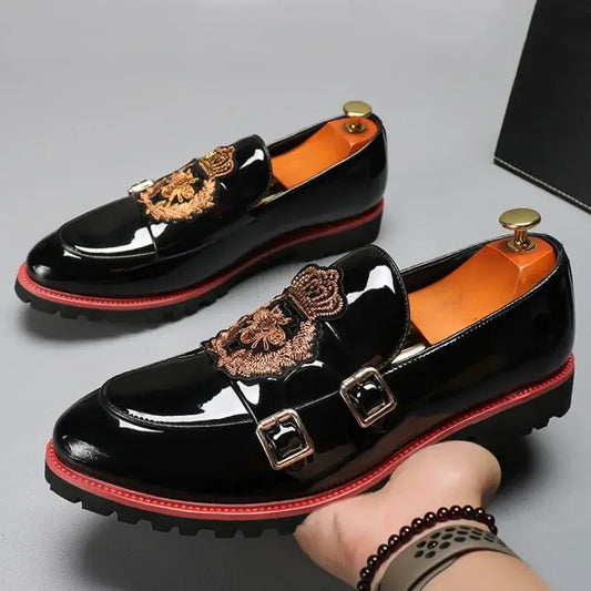 Men's black embroidered monk shoes with double buckles and red trim