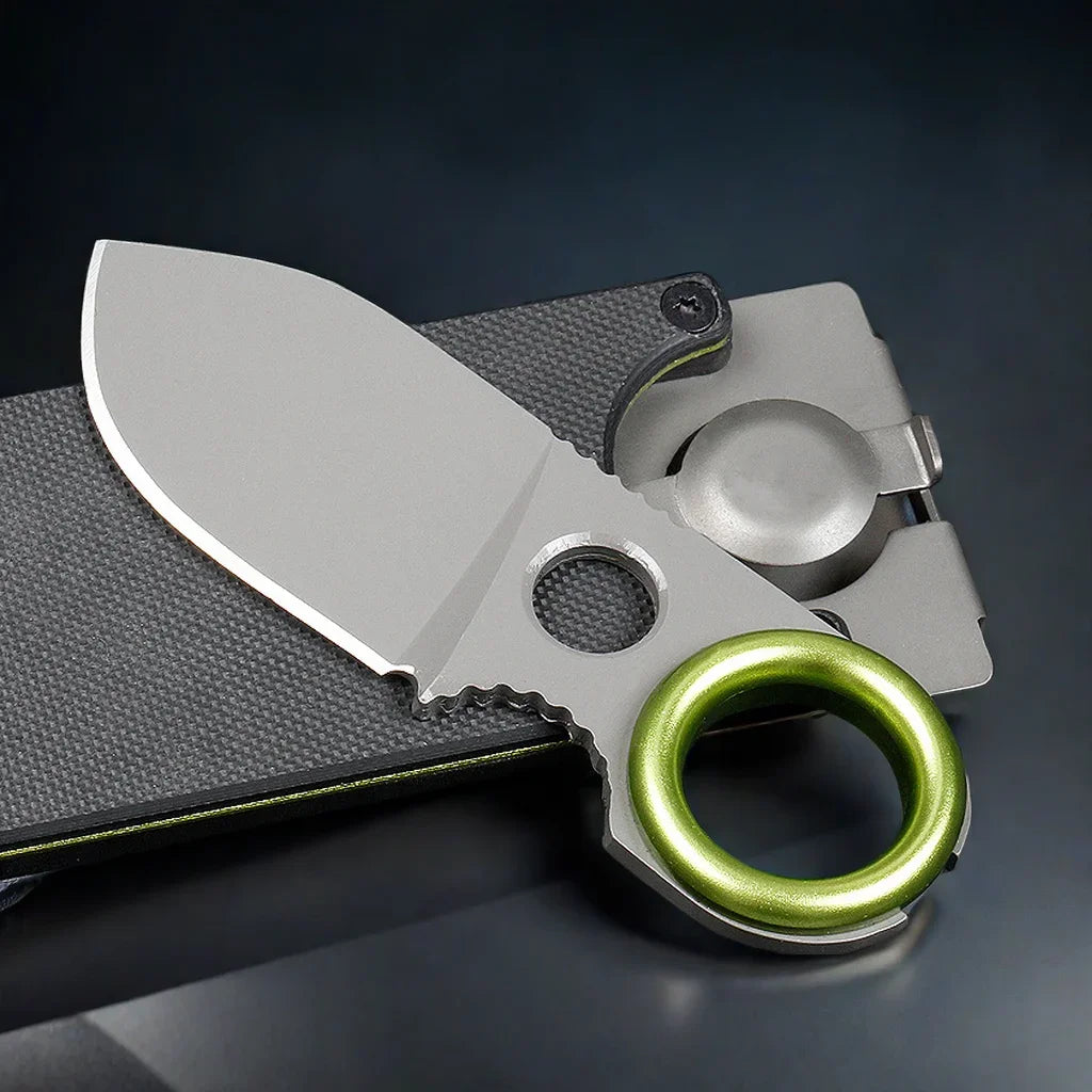 Compact folding pocket knife keychain with stainless blade and green key ring