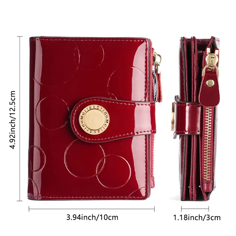 Wine red women’s short wallet with glossy finish, gold-tone snap flap, and zip compartment