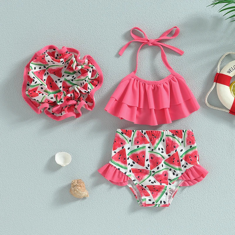 Toddler ruffle bikini with pink halter top, watermelon print bottoms, and hat