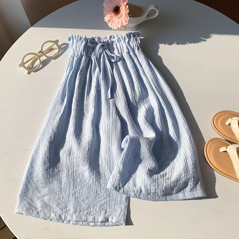Light blue toddler summer pants with elastic waist and gathered drawstring
