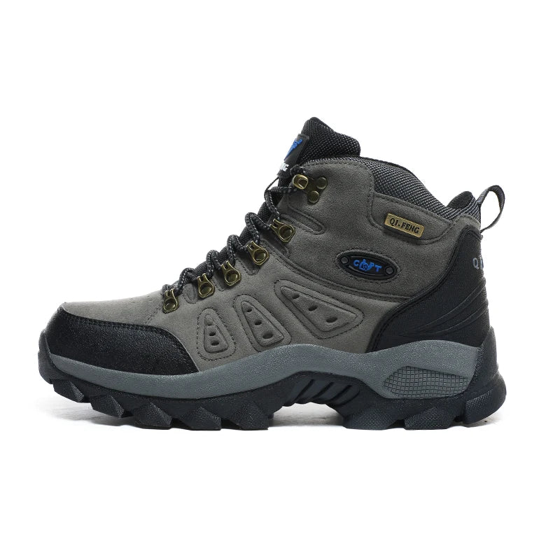 High-top adventure sneaker in dark grey, lace-up with textured overlays and tread