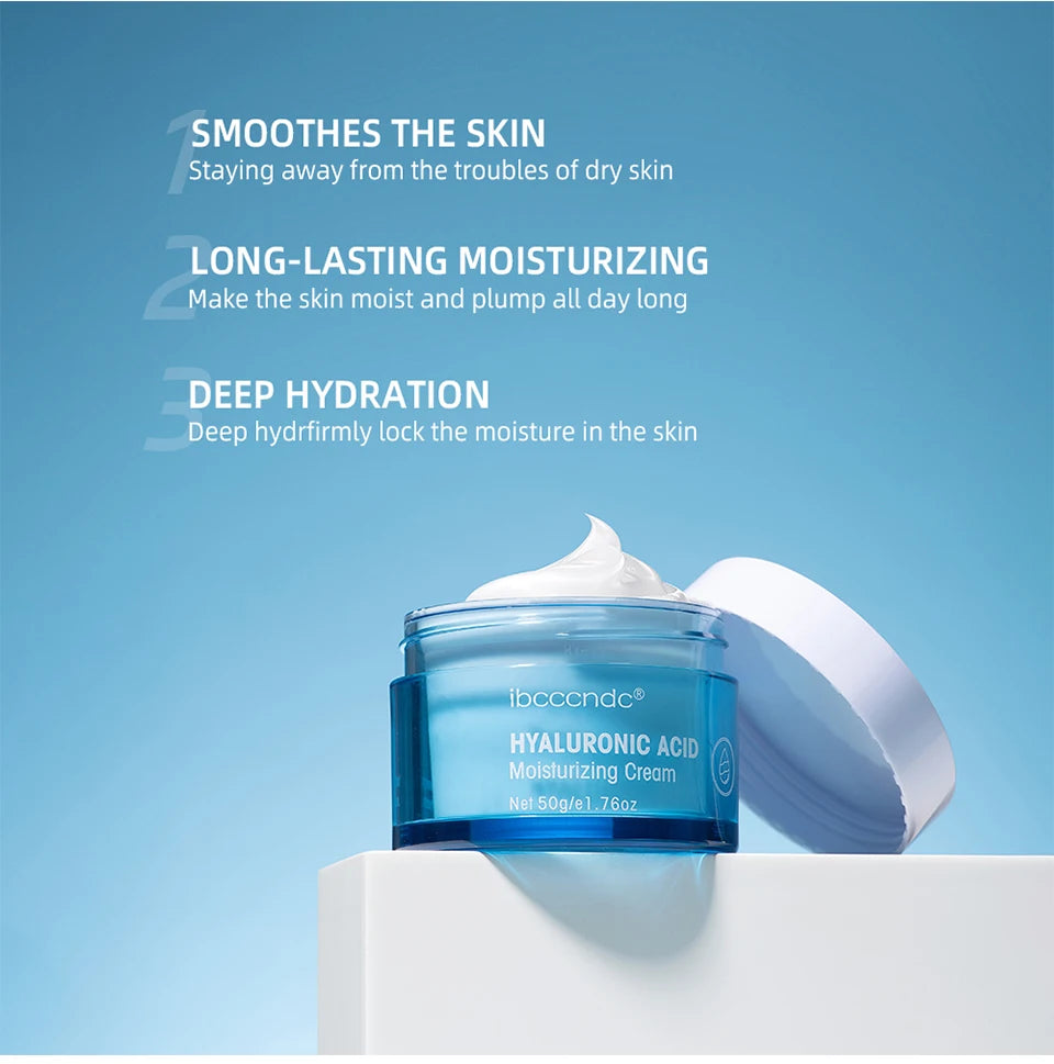 Blue moisturizer cream jar with open lid and white cream dollop on a stand