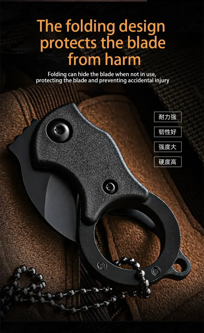 Black mini folding pocket knife with keychain ring, folded blade visible